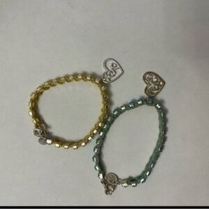 Peace and xoxo bracelets
Yellow xoxo
Blue peace